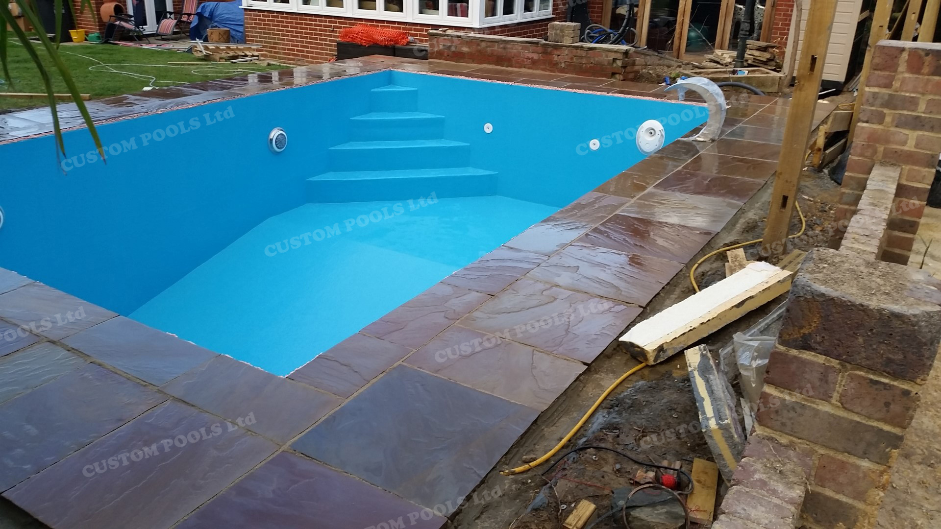 Made to order fibreglass pool with waterfall